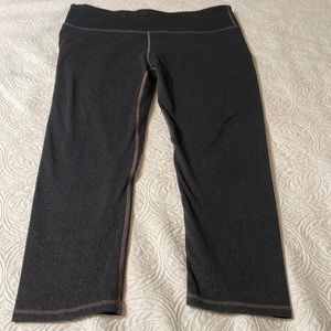Fabletics black Capri running pants.